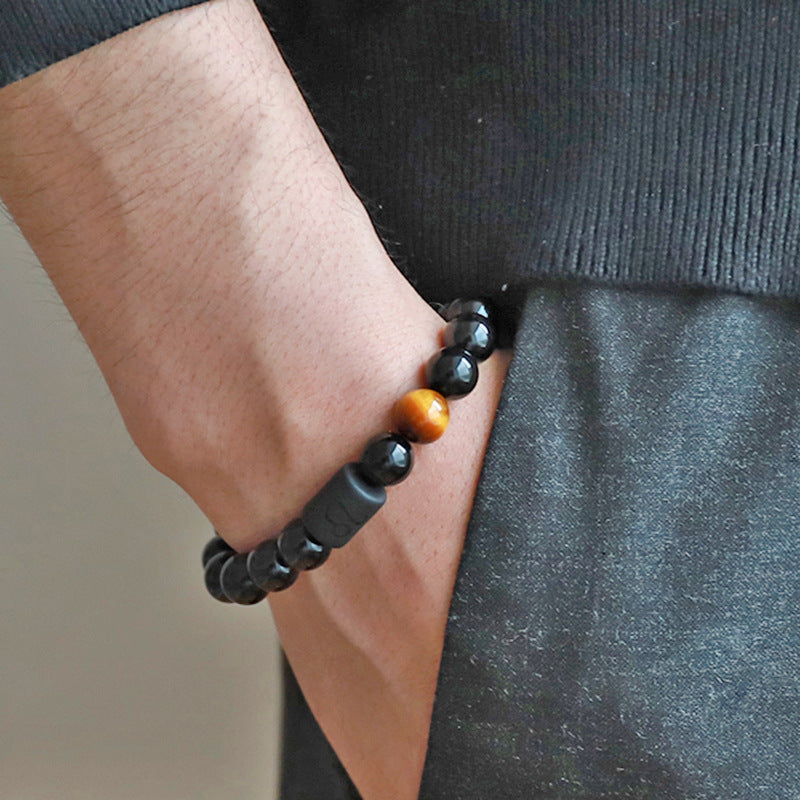 Bracelet unique en perles noires pour hommes