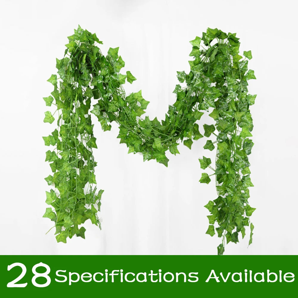 Artificial green leaf garland spelling 'M' on a white background
