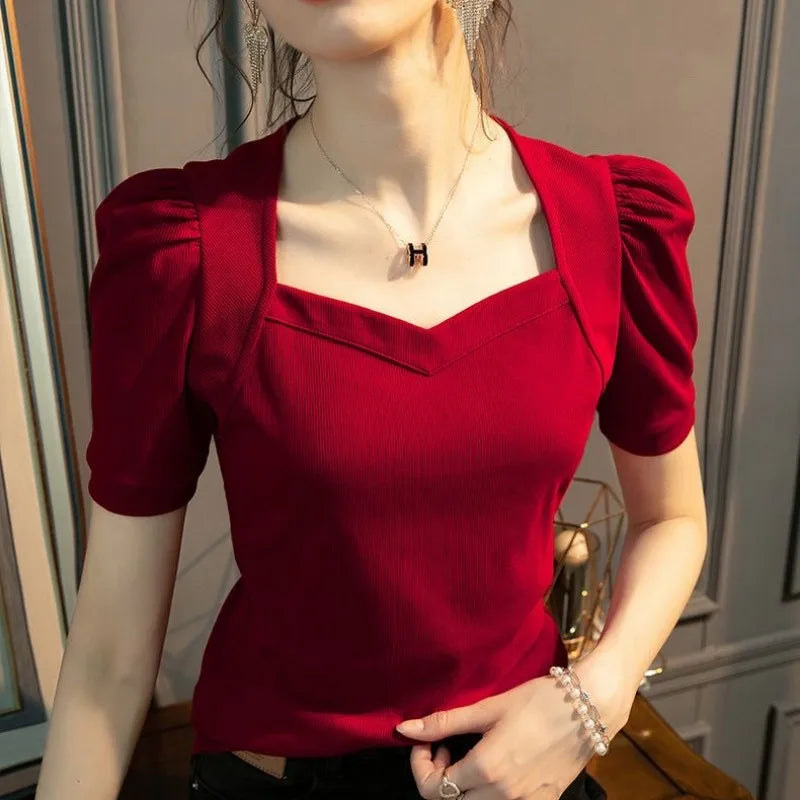 Blouse slim à manches bouffantes et col carré