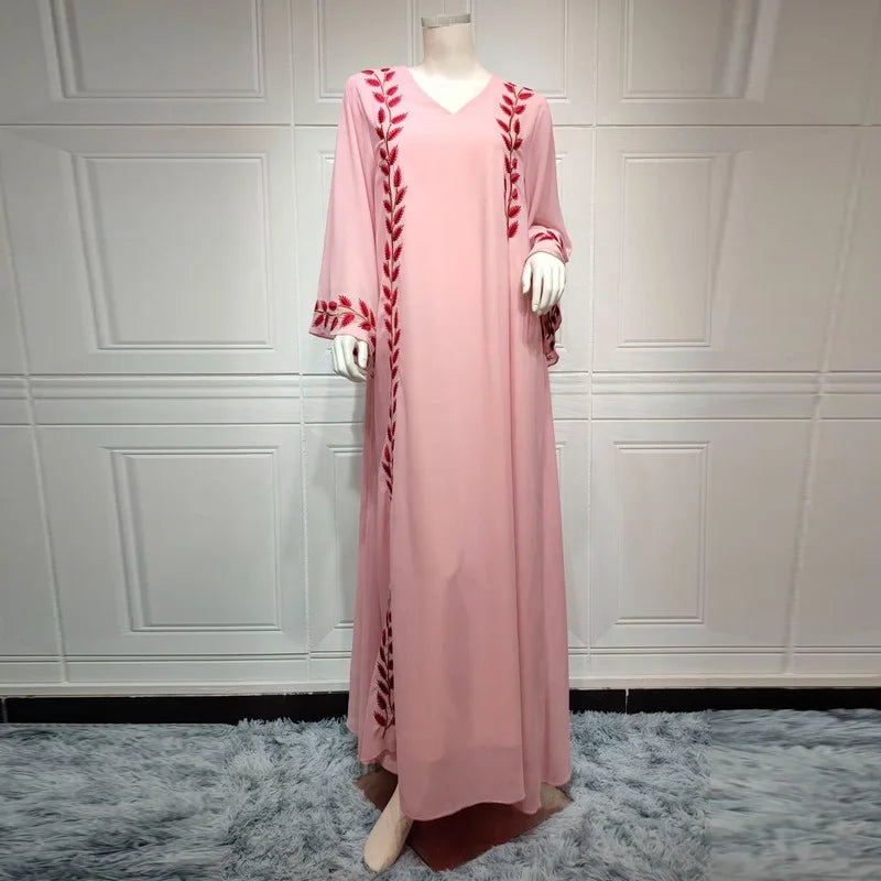 Rosa Abaya-Kleid mit muslimischer Stickerei