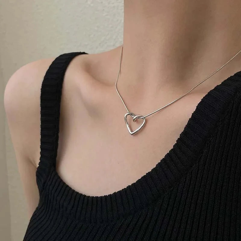 Collier chaîne clavicule double cœur en argent