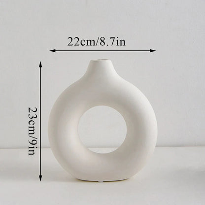 1 vase à fleurs minimaliste en plastique en forme de beignet