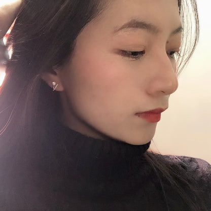 Boucles d'oreilles à tige en argent et zircons torsadés LIVVY