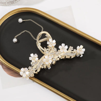 Haarspange mit Rosen und Schmetterlingen, goldfarbene Quaste