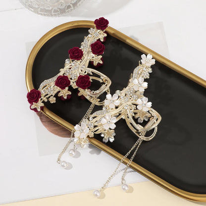 Haarspange mit Rosen und Schmetterlingen, goldfarbene Quaste