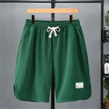 green shorts