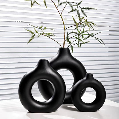 1 vase à fleurs minimaliste en plastique en forme de beignet