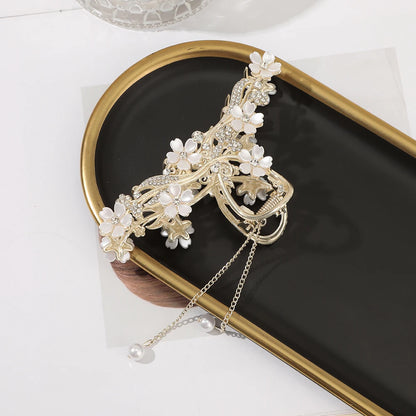 Haarspange mit Rosen und Schmetterlingen, goldfarbene Quaste