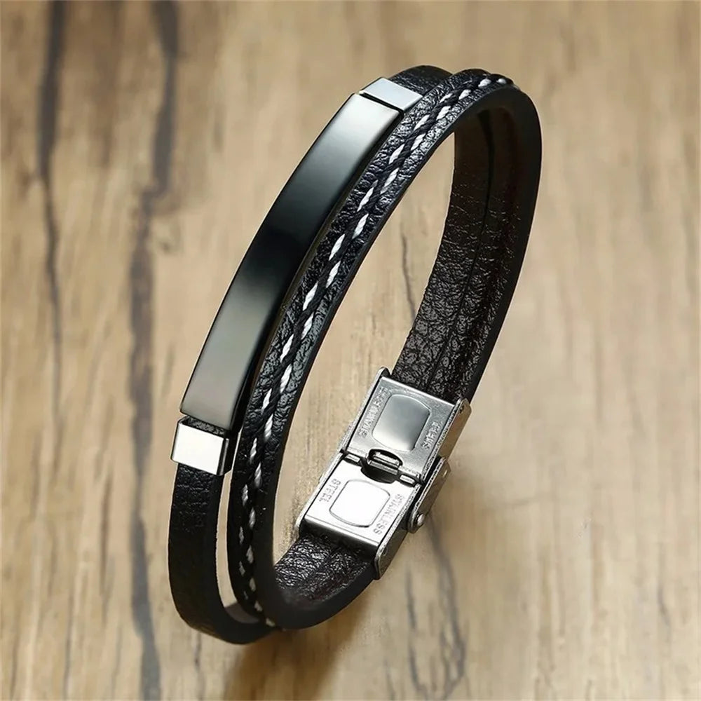 Bracelet à breloques en cuir et acier inoxydable