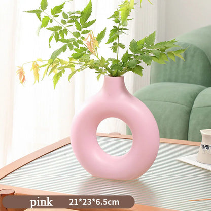 1 vase à fleurs minimaliste en plastique en forme de beignet